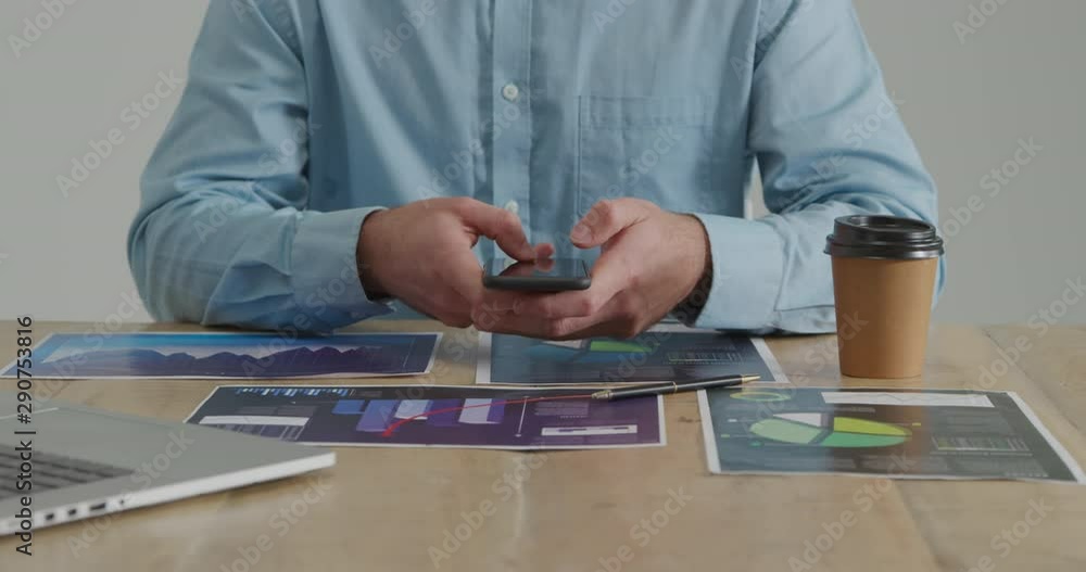 Man using smartphone Man using smartphone