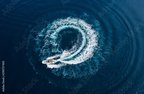 Aerial view of speed motor boat on open sea © Jag_cz