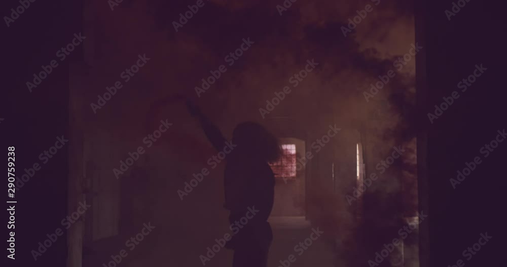 Fashionable young woman in an abandoned warehouse Fashionable young woman in an abandoned warehouse