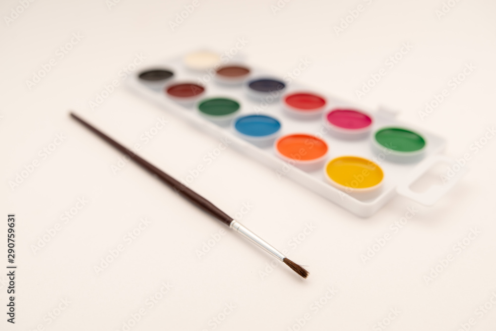 watercolor paints in box on white background watercolor paints in box on white background