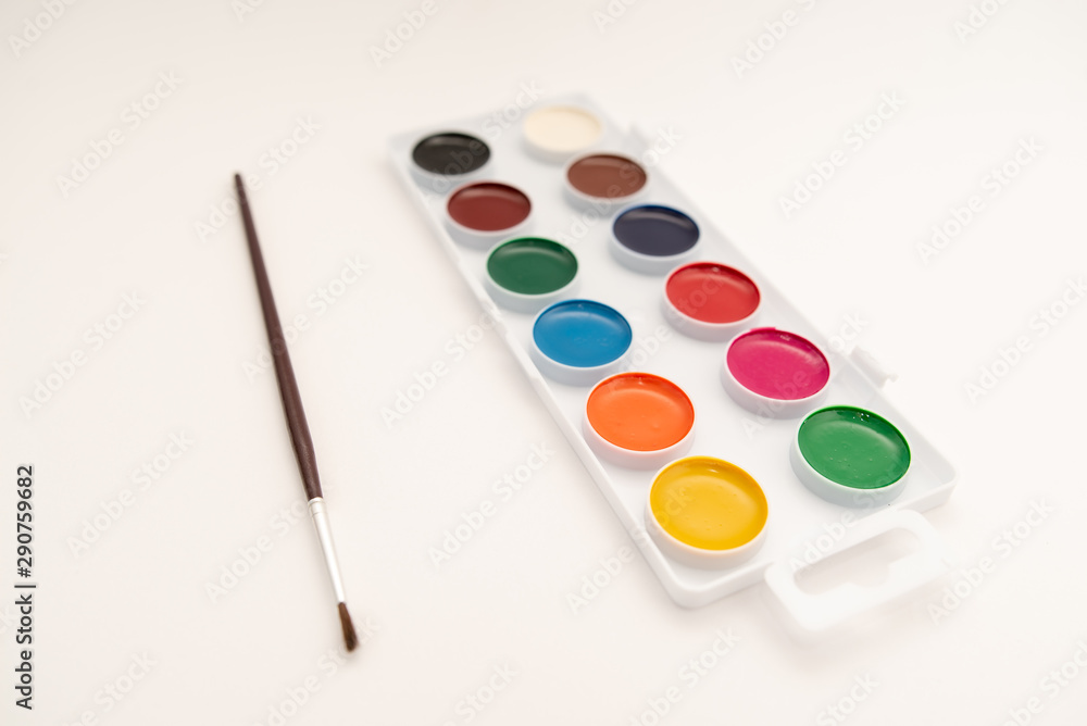 watercolor paints in box on white background watercolor paints in box on white background