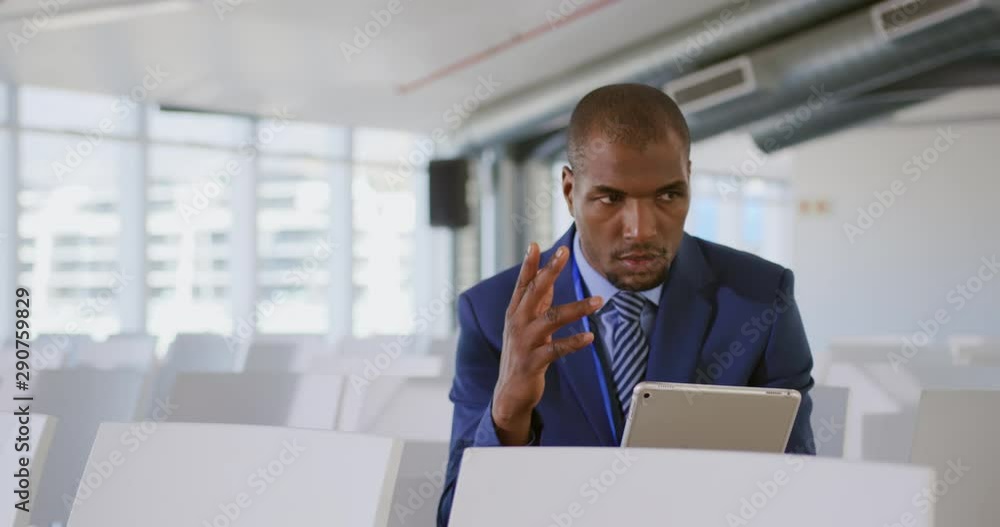 Male speaker practicing his speech at a business conference Male speaker practicing his speech at a business conference