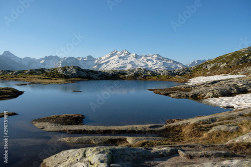 snowy mountains in early summer in the swiss alps near the Grimselpass, Switzerland, europe