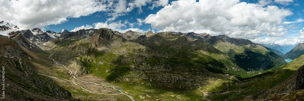 Panorama of Martell valley in South Tyrol on a partly cloudy day in summer