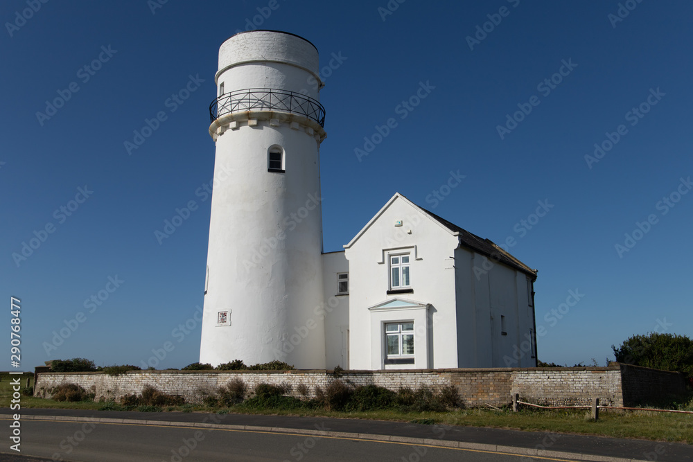 The lighthouse at Old Hunstanton seen on a day with clear blue skies on 17th Sept 2019.