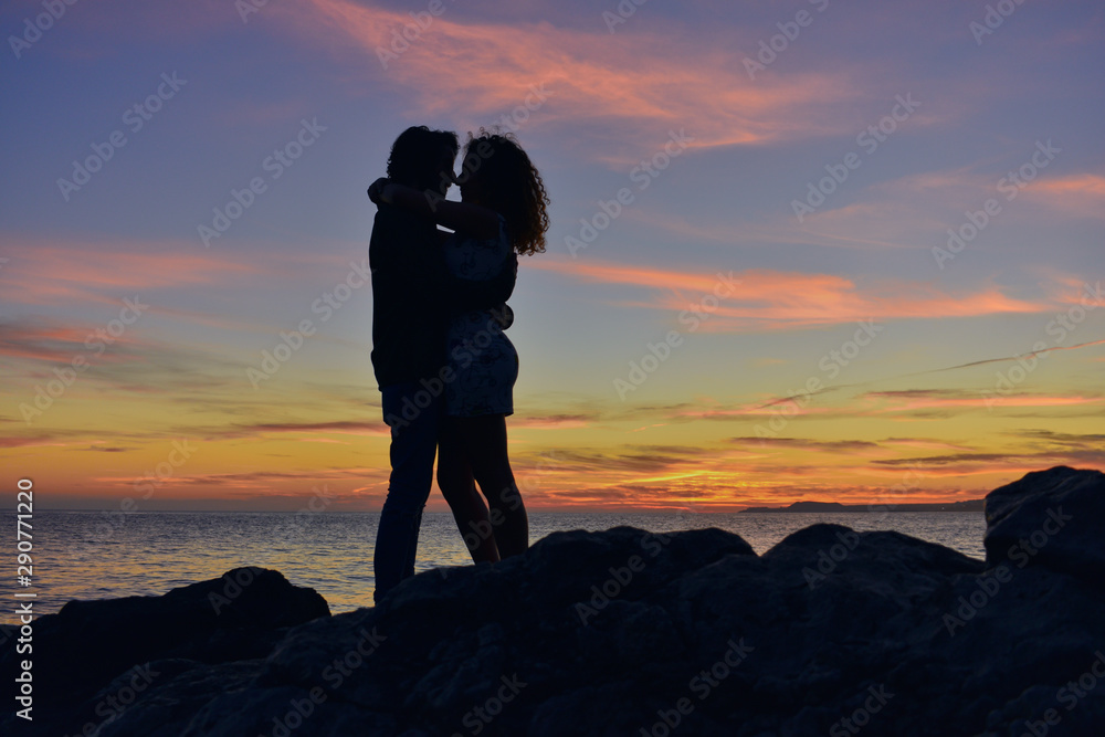 romantic couple at sunset