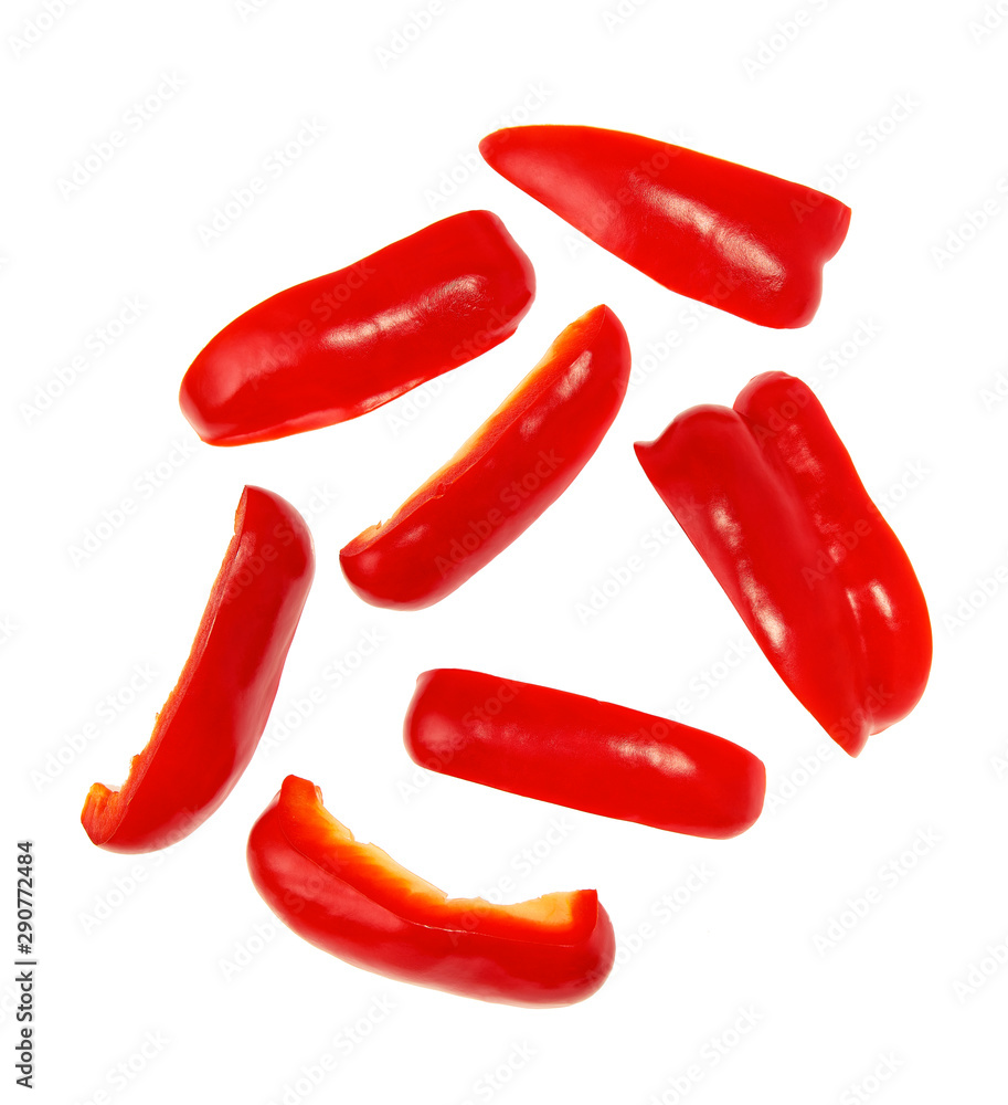 Cut slices of red sweet bell pepper isolated on white background, top view. Clipping Path Cut slices of red sweet bell pepper isolated on white background, top view. Clipping Path