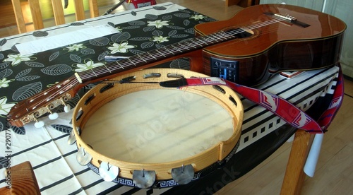 classical guitar and tammorra on the table photo