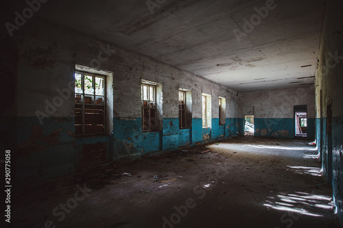 Dark dirty corridor of old abandoned building © Mulderphoto