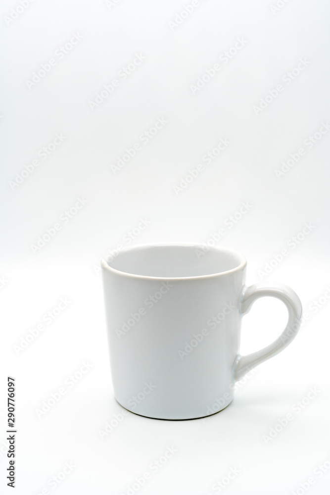White coffee cup There is a glass handle on the left With a white background, isolated White coffee cup There is a glass handle on the left With a white background, isolated