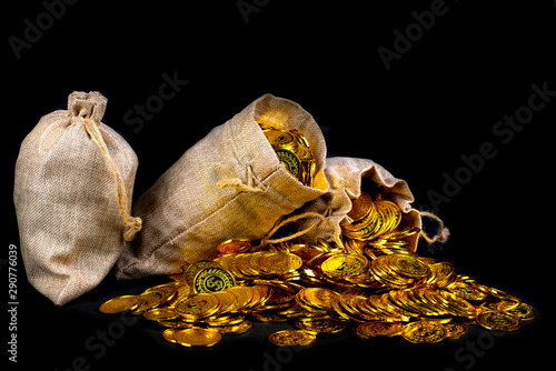 Stack gold coin in treasure sack