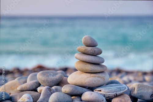 Zen balanced stones stack on beach