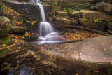 Waterfall Kaskady Myi in autumn in Sudety mountains, Przesieka, Poland