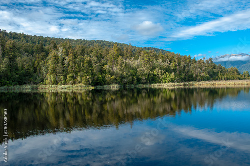 Fototapeta Naklejka Na Ścianę i Meble -  Lake Matheson￨Fox Glacier￨Aoraki/Mount Cook & Mount Tasman￨Te Wahipounamu￨The Place of Green Stone￨World Heritage in South West New Zealand