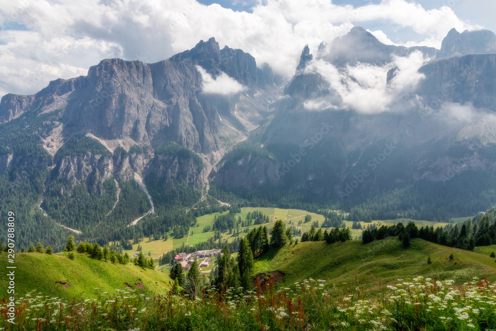 Scenic view of mountain valley and village of Colfosco in the Italian Dolomites. Italian Alps, Alto Adige, Corvara in Badia.