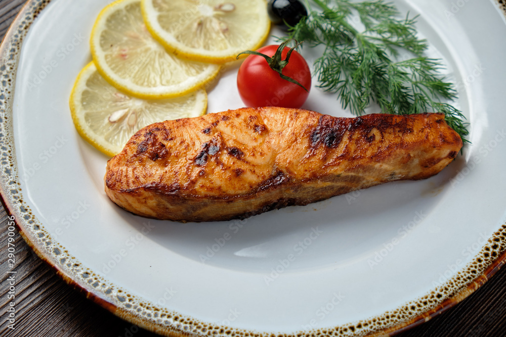 Grilled salmon steak with side dish . catering menu Grilled salmon steak with side dish . catering menu