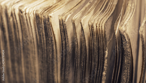 Close up old book pages background. Macro view.