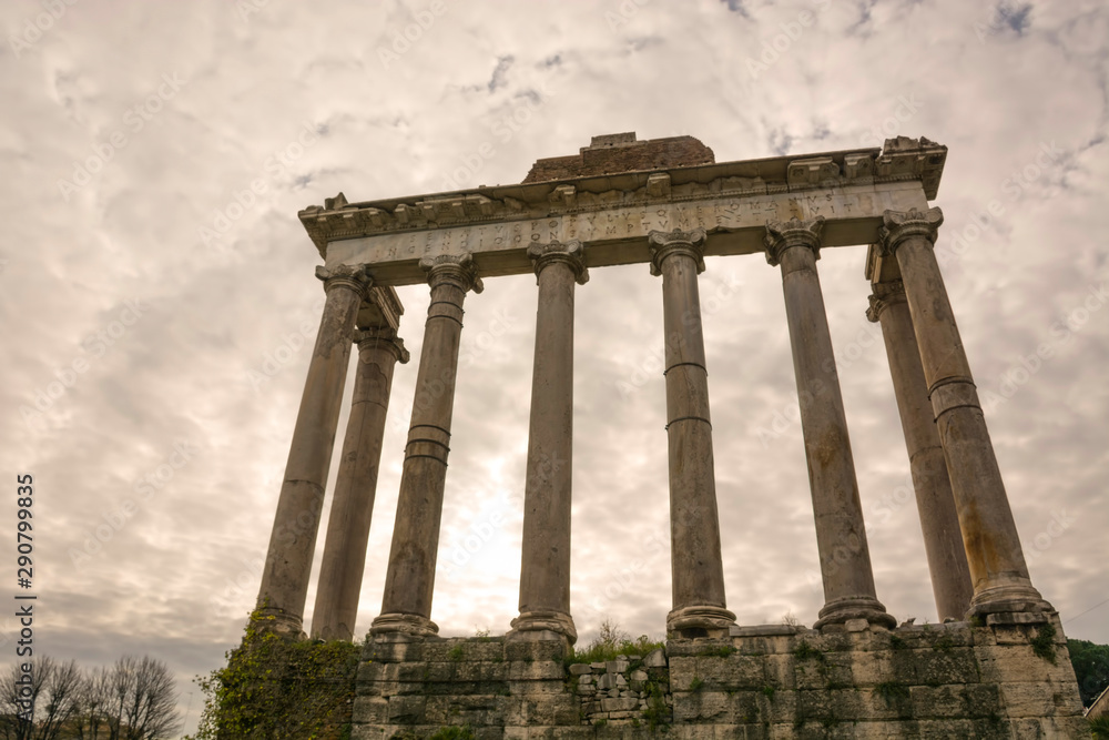 Roman Forum Temple of Saturn ruins in Rome, Italy. Italian ancient buildings and landmarks
