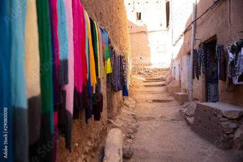  Colorful handmade fabrics on a street in Morocco © diegorayaces