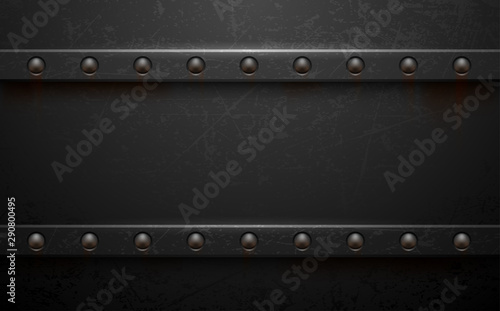 Dark metal background with rivets photo