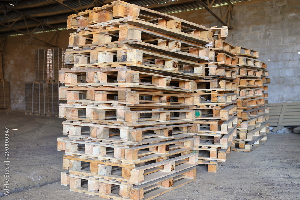Empty wooden pallets are folded for later use. Not big business. Empty wooden pallets are folded for later use. Not big business.