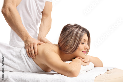 Relaxed young woman having a massage on her back