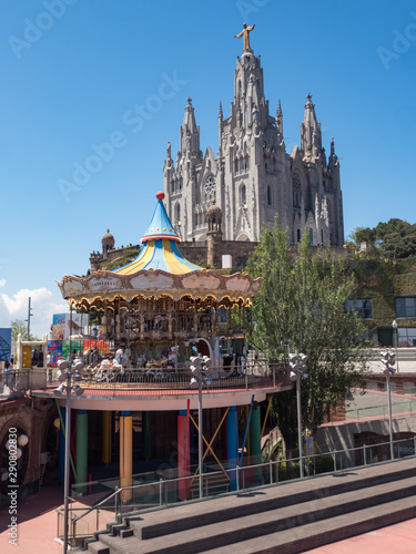 Spain  may 2019  Scenic view of Barcelona city with colourful ferris wheel from Tibidabo
