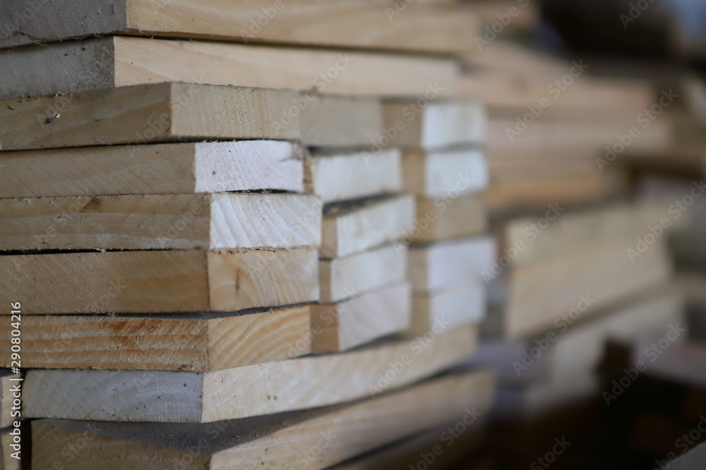 Wooden boards harvested for the furniture industry. With a shallow depth of field. Tree structure. Wooden boards harvested for the furniture industry. With a shallow depth of field. Tree structure.