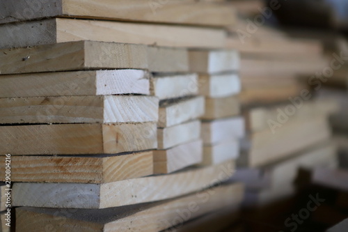 Wooden boards harvested for the furniture industry. With a shallow depth of field. Tree structure.