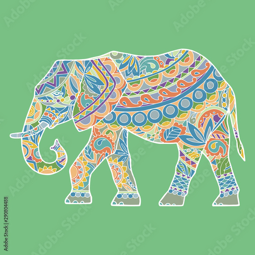 Vector silhouette of adult elephant, side view. Big elephant in motion. Colorful elephant in ethno style. A festive elephant on a white background. The silhouette is drawn manually.