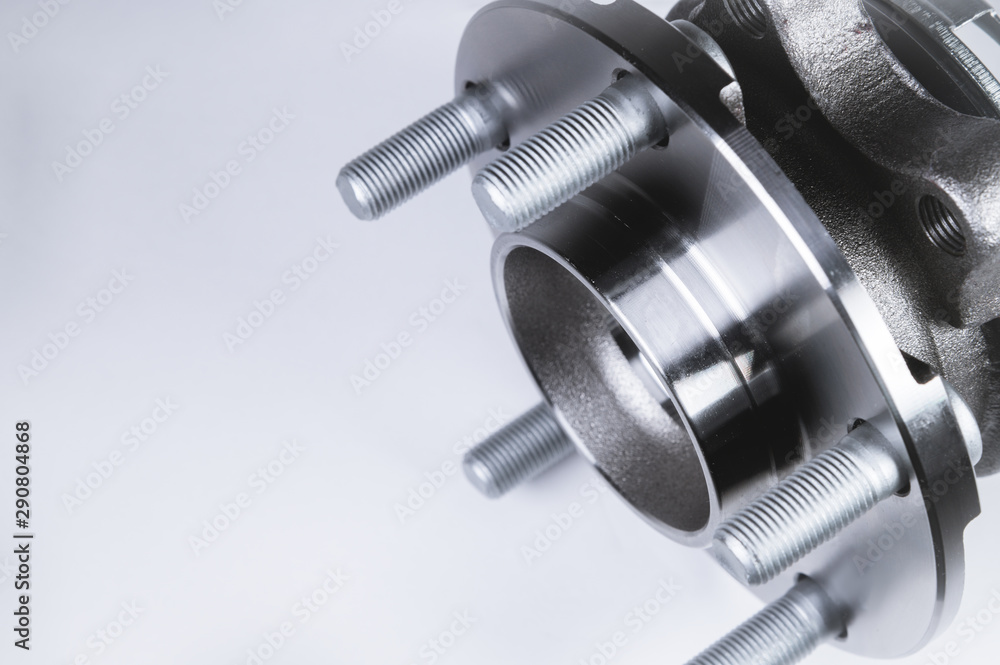 New Wheel hub assembly with bearing. This is part of the car suspension on a gray background with a gradient. The concept of new car parts New Wheel hub assembly with bearing. This is part of the car suspension on a gray background with a gradient. The concept of new car parts