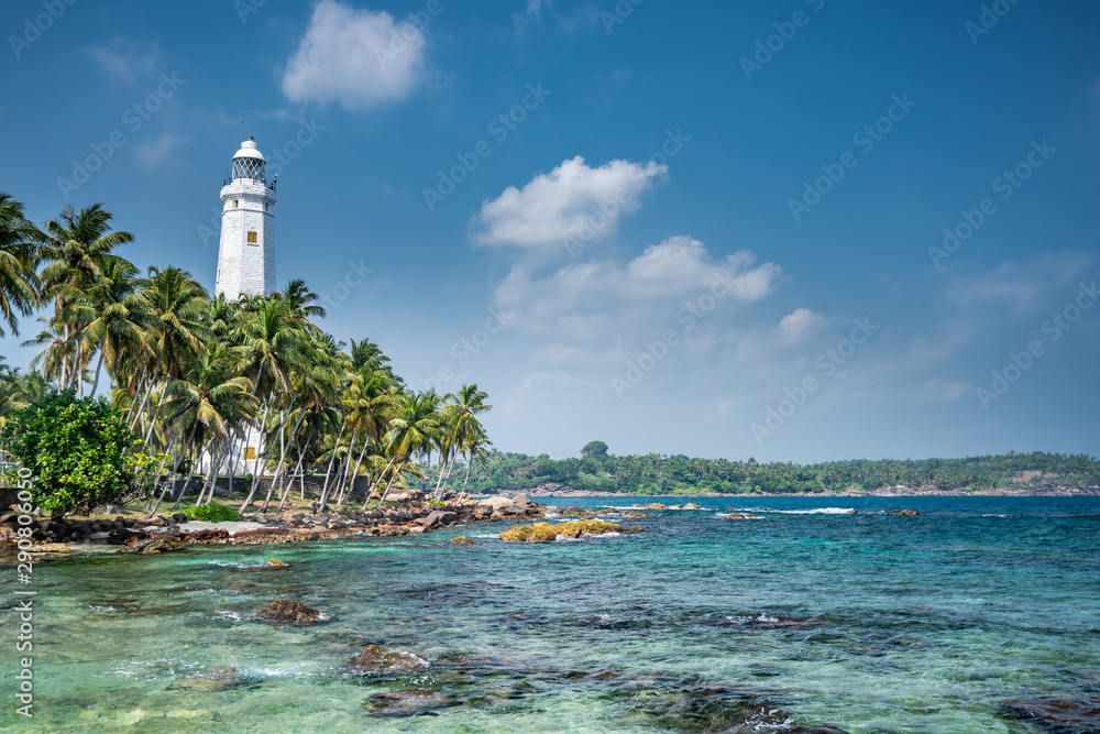 Lighthouse and beautiful beach landscape in Sri Lanka Lighthouse and beautiful beach landscape in Sri Lanka