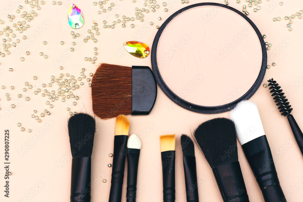 foundation powder, Set of makeup brushes isolated on pink background foundation powder, Set of makeup brushes isolated on pink background
