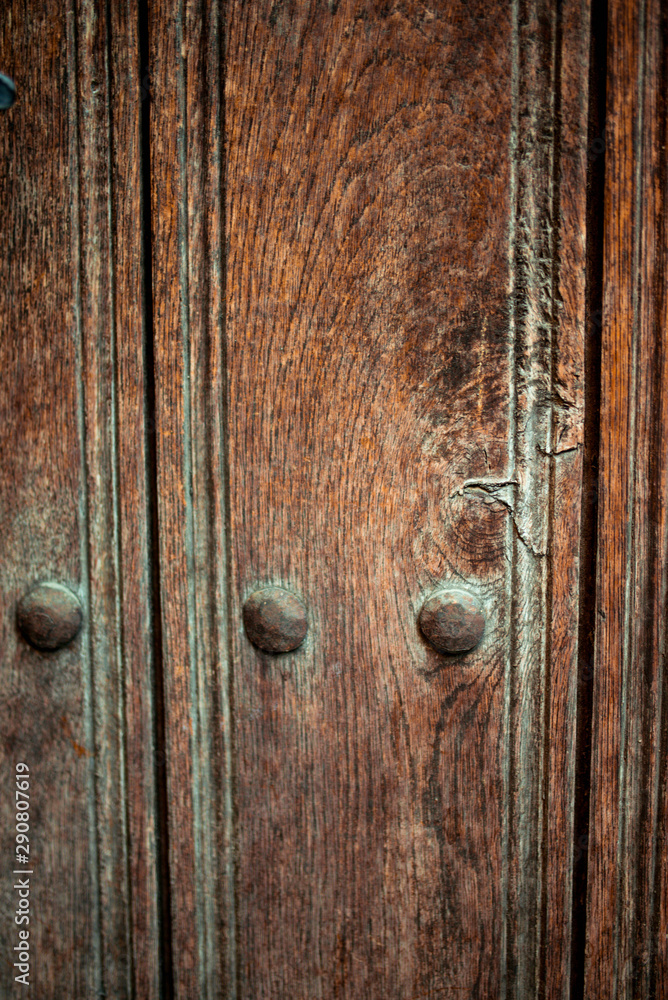 old wooden door with beautiful metal elements old wooden door with beautiful metal elements