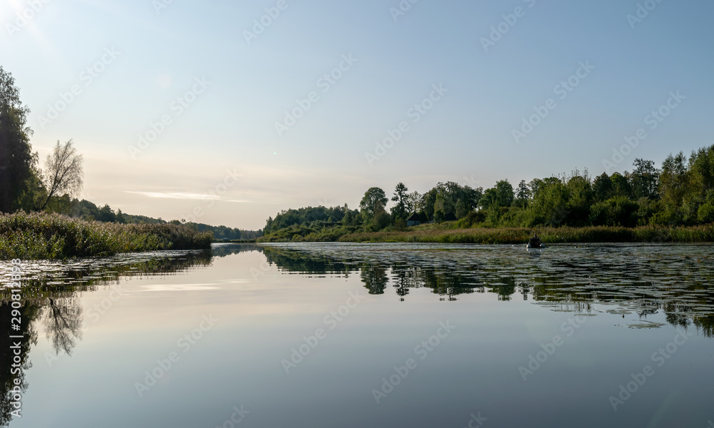 Fototapeta premium Beautiful morning fog on the lake. Forest, lake, in the fog. Mysterious fog