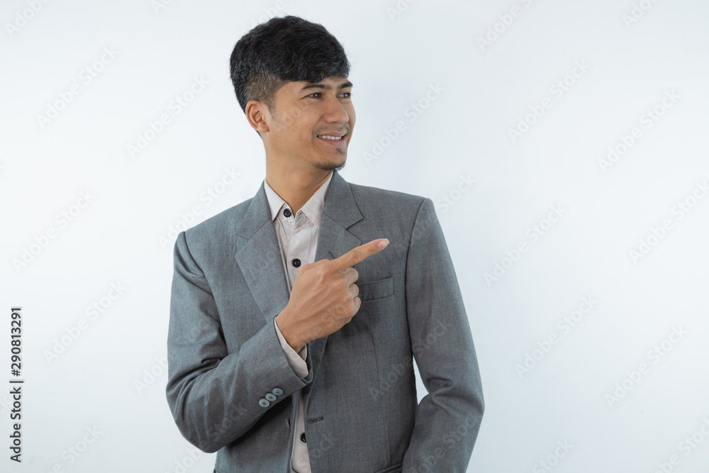 Business asian man showing something on the palm of his hand on white isolated background Business asian man showing something on the palm of his hand on white isolated background
