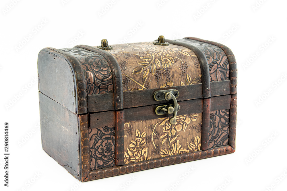 An antique casket stylized as a suitcase. Isolated on a white background. An antique casket stylized as a suitcase. Isolated on a white background.