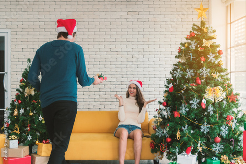 Christmas couple with present.