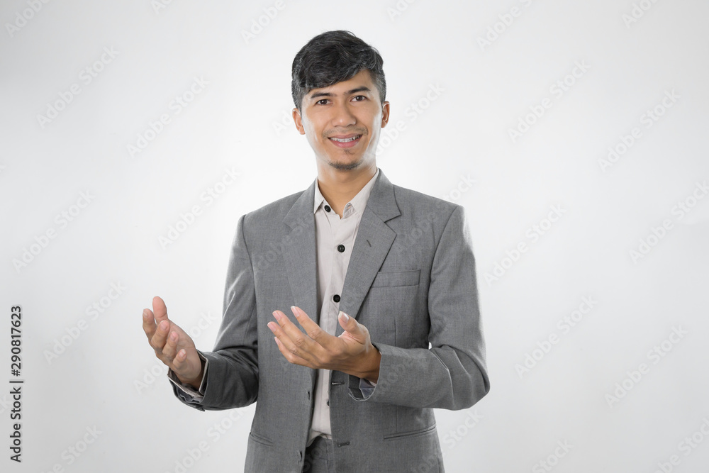 Business asian man showing something on the palm of his hand on white isolated background Business asian man showing something on the palm of his hand on white isolated background
