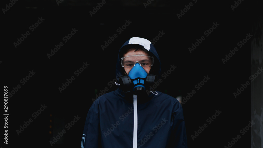 Protection respirator half mask for toxic gas.The man prepare to wear protection air pollution in the chemical industry Protection respirator half mask for toxic gas.The man prepare to wear protection air pollution in the chemical industry