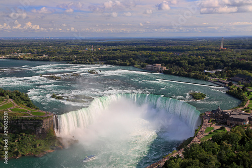 Aerial view of Horseshoe Falls including Maid of the Mist sailing on Niagara River, Canada and USA natural border