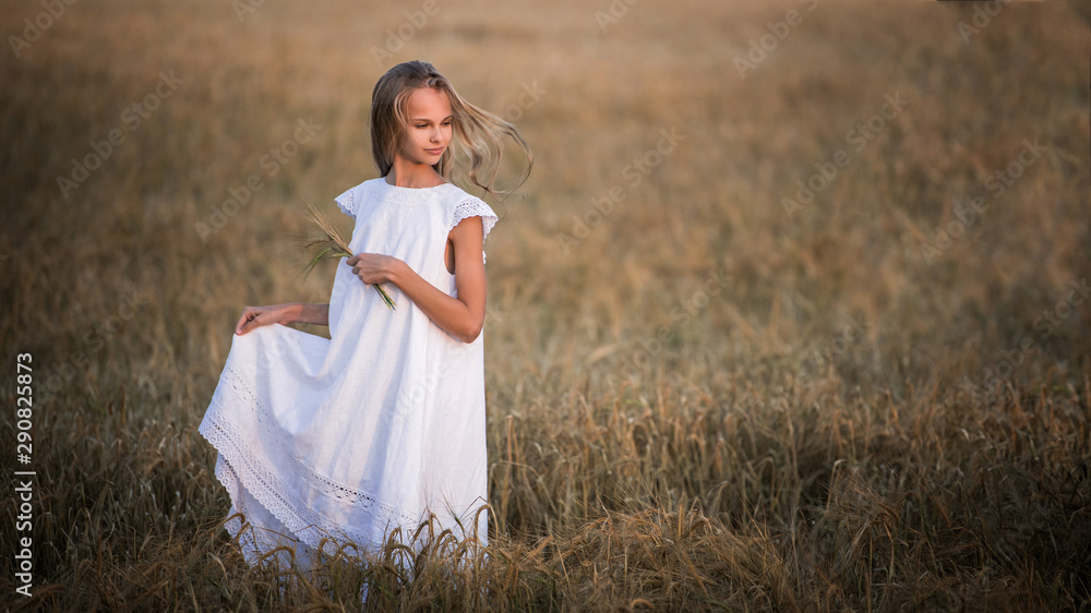 Portrait of a teenage girl in a wheat field Portrait of a teenage girl in a wheat field