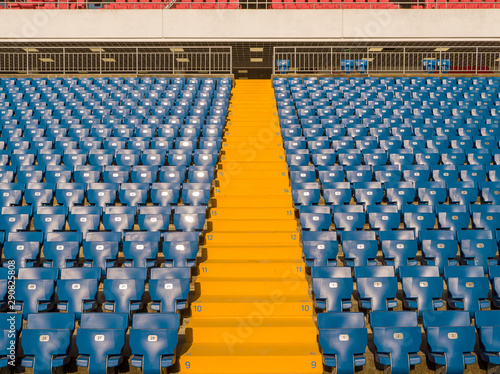 Rows of spectator seats at a football stadium