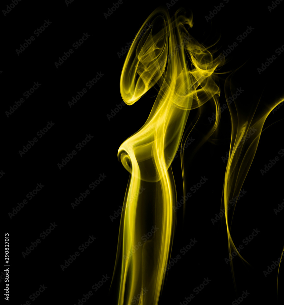 Yellow smoke on black background Yellow smoke on black background