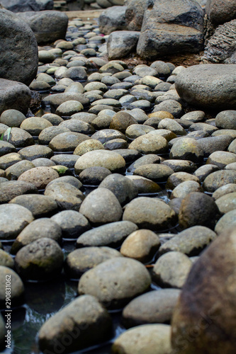 Beautiful naturally rounded stones in the dry pond