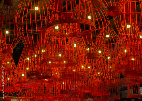 Beautiful red decorative bamboo lights on the ceiling © whitepointer