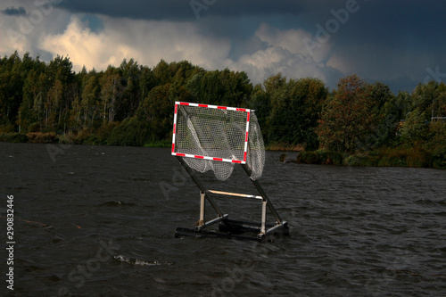 canoe polo gate on the lake before a thunderstorm photo