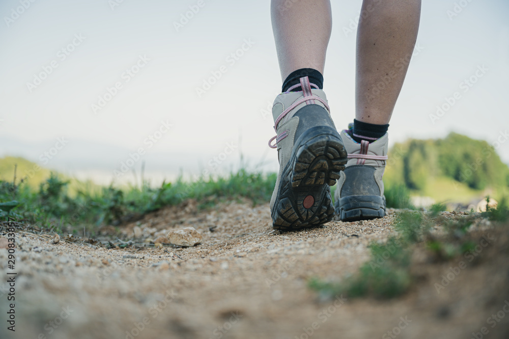 Low angle view of female hiker Low angle view of female hiker