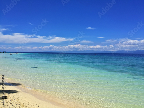 White Sand Beach and the turquoise ocean in Moalboal, Cebu, Philippines