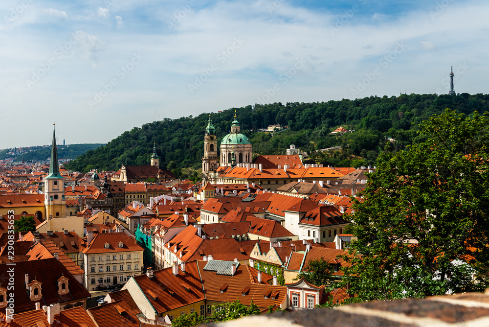 View on Prague panorama with red roofs and historic architecture